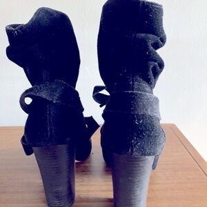 Black ankle peep toe tie boots in great condition.